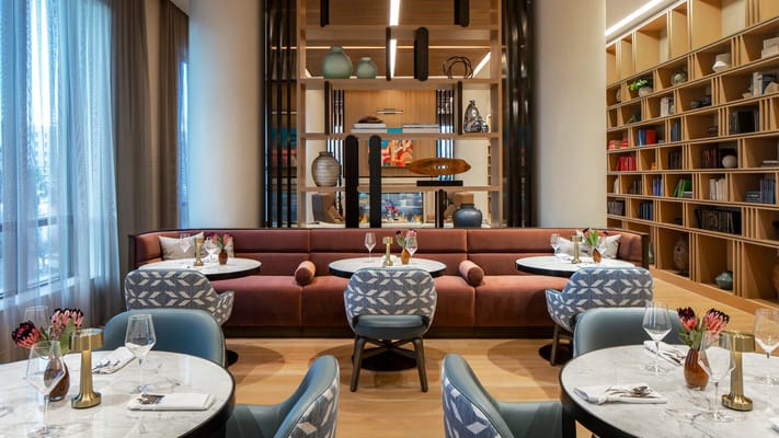 Elegant dining area with tables set for meals