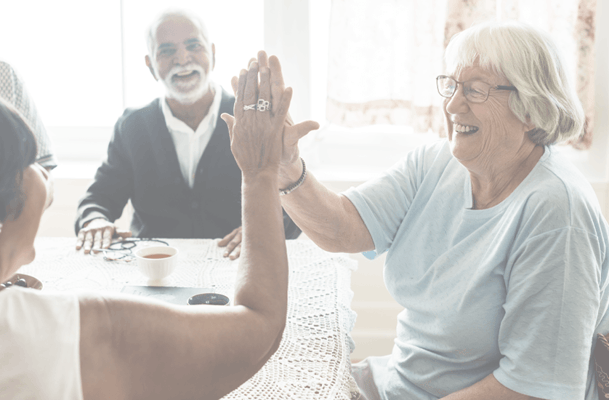 Residents enjoying a playful game at a common area