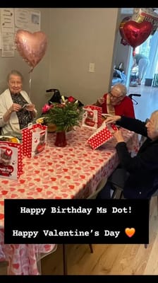 Residents celebrating a birthday and Valentine's Day together