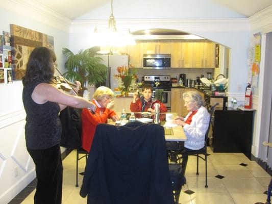 Residents enjoying music in a common area