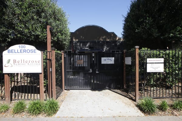 Entrance gate and signage of Bellerose Senior Living