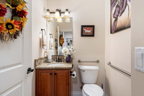 Interior view of a small bathroom with decor