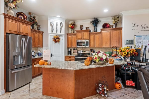 Interior view of a kitchen with decor and flowers