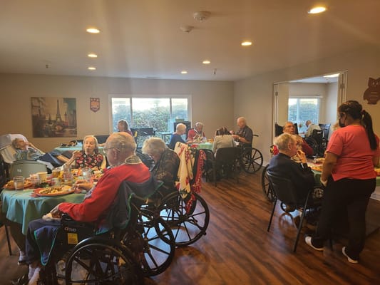 Residents enjoying a meal in a common area