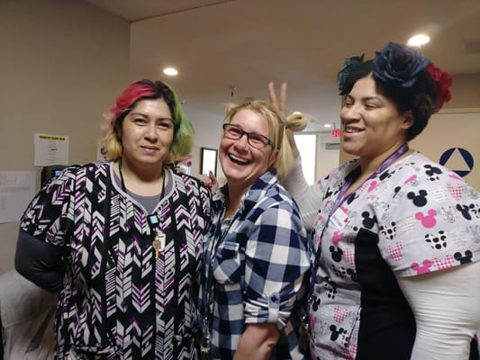 Staff members enjoying a lighthearted moment in the facility