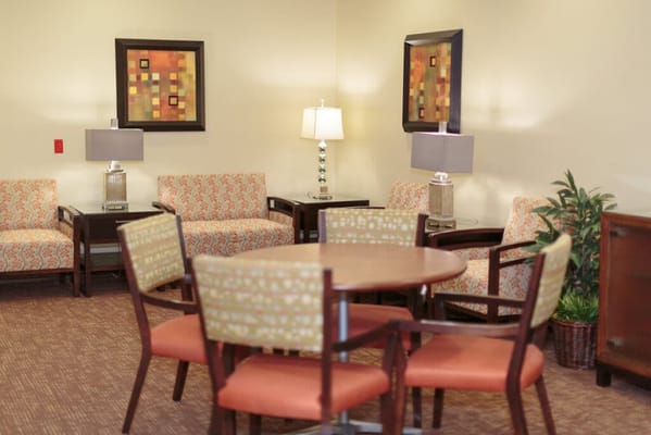 Comfortable lounge area with seating and lamps