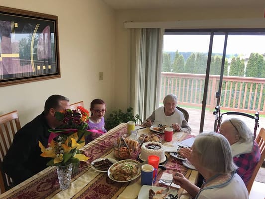 Residents enjoying a meal together in a dining area