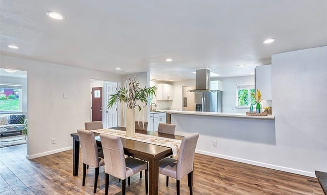 Bright, modern interior space with dining area