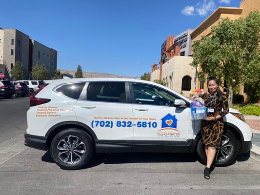 Staff member with a vehicle promoting home health care services