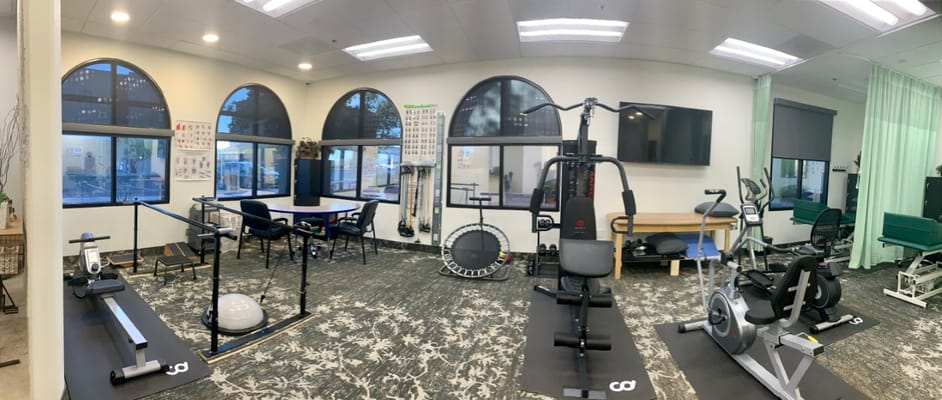 Inside view of a fitness area with exercise equipment
