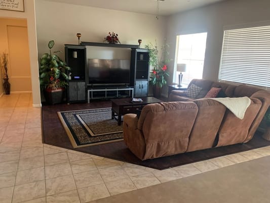 A cozy lounge area with seating and decorations