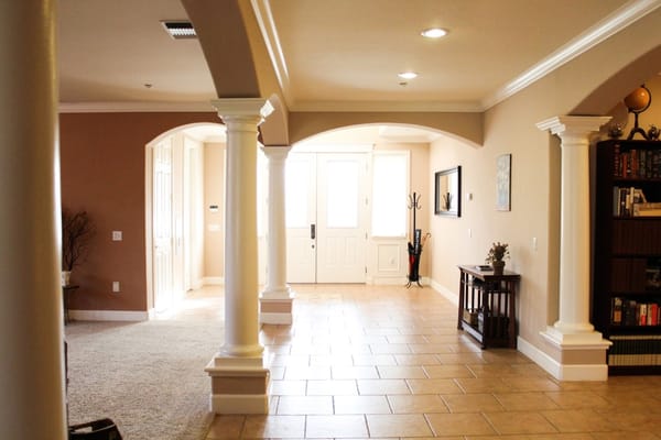 Interior view of a welcoming common area with columns