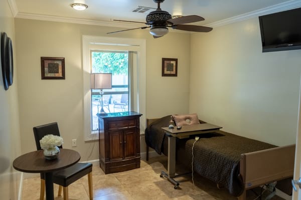 Cozy interior of a resident room with furniture