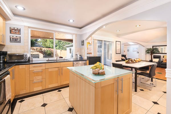 Bright and spacious kitchen area with dining space