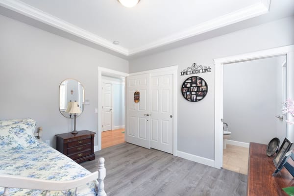 Bright interior of a private resident room with light decor