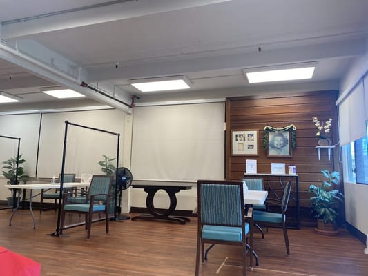 Interior view of a dining area with tables and decorations