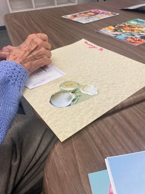 An elderly person engaged in an arts and crafts activity