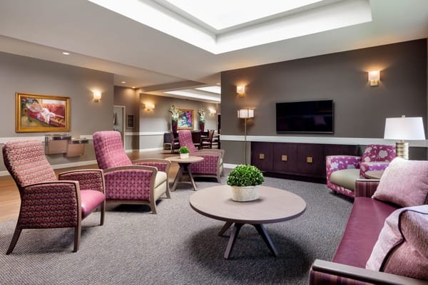 Cozy common area with seating and artwork