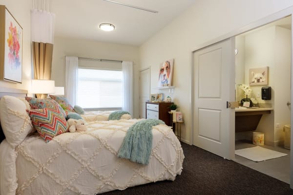 Cozy private room with twin beds and decor