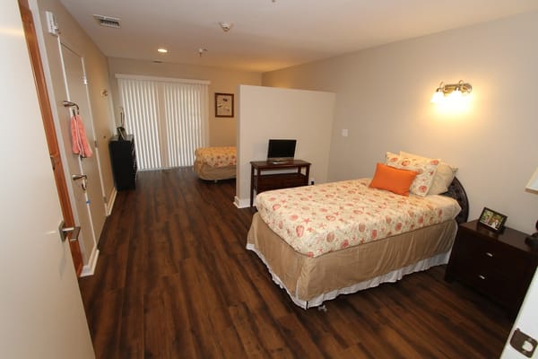 Interior view of a resident room with two beds
