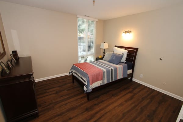 Cozy resident room with a bed and natural light