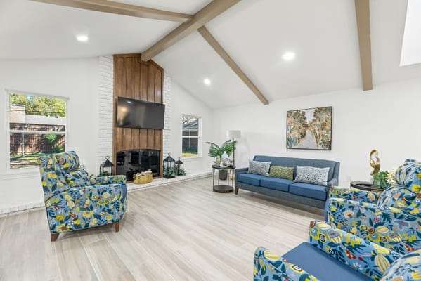 Bright living area with seating and decor