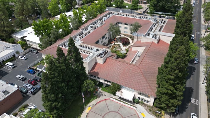 Aerial view of the assisted living facility with gardens