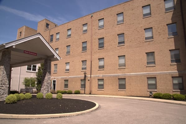 Main entrance with canopy at Simpson House.