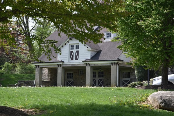 Exterior of The Hearth at Drexel surrounded by greenery