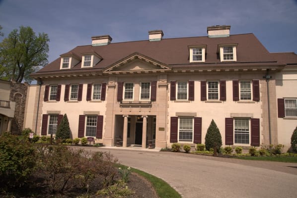 Front view of The Hearth at Drexel senior living facility