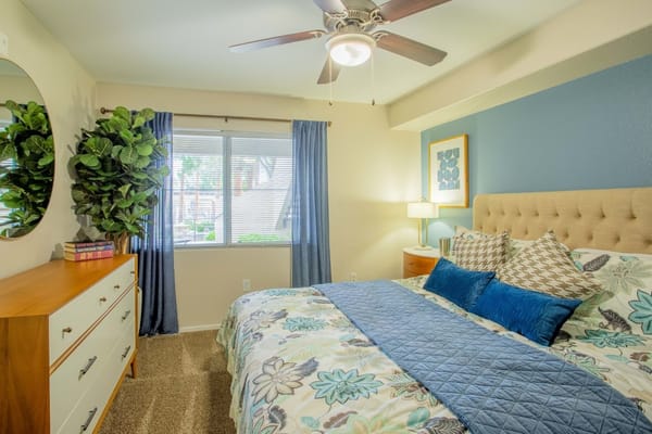 Private resident room with a cozy bed and window