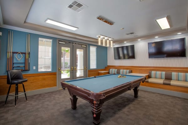 Interior common area with a billiards table
