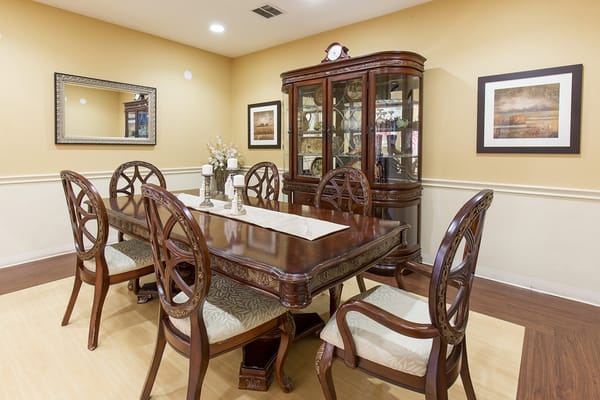Elegant dining room with a wooden table and chairs