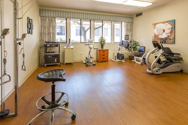 Interior view of a fitness room with exercise equipment