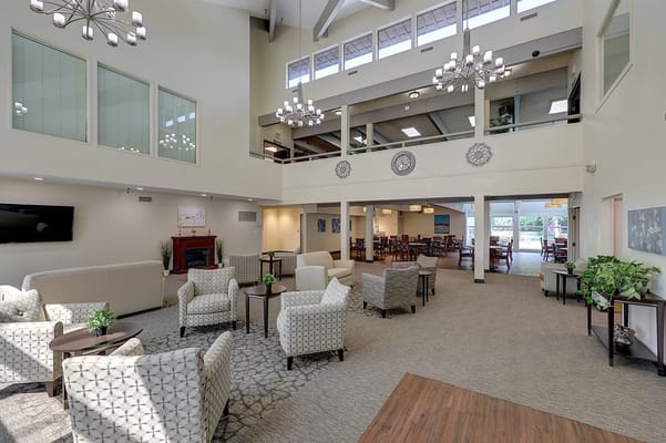 Spacious common area with seating and dining space