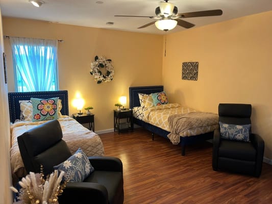 Bright, cozy interior of a shared resident room