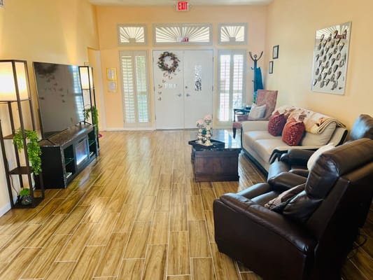 Bright common area with seating and decor