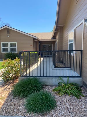 Entrance view with railing and landscaping at Gettysburg Christian Home