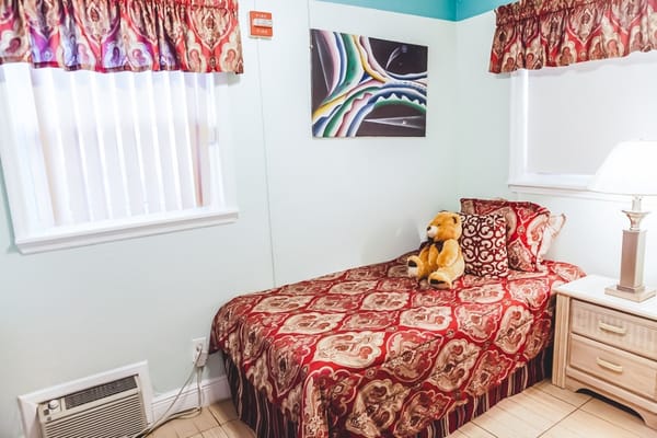 Cozy private resident room with a bed and decor