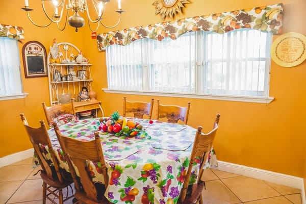 Bright dining room with colorful table setting