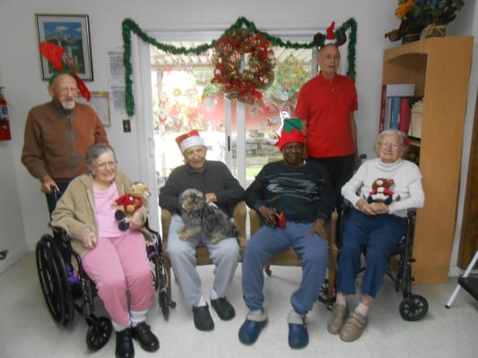 Residents enjoying a festive gathering with holiday decorations