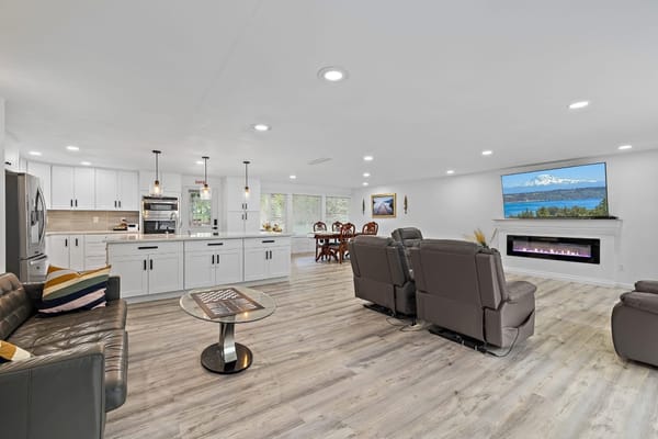 Spacious common area with seating and dining space