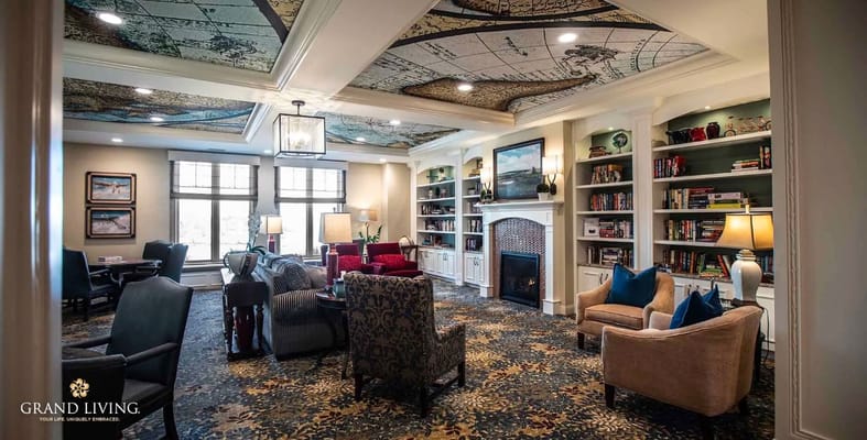Cozy common area with bookshelves and seating
