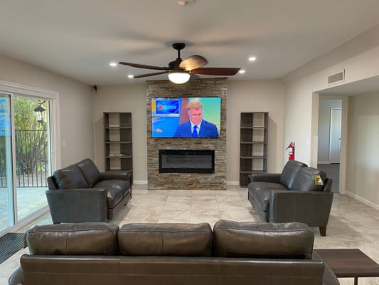 Interior common area with seating and television