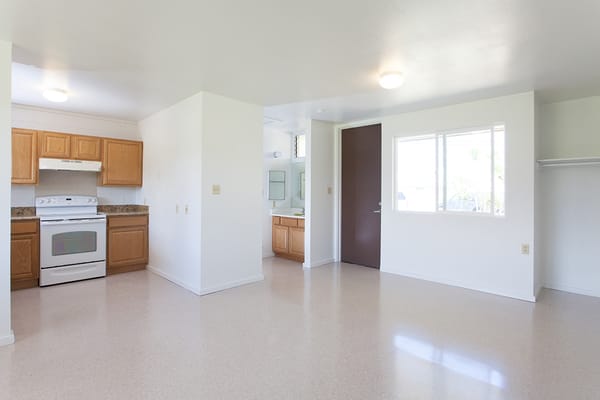 Interior view of a resident room with kitchen appliances
