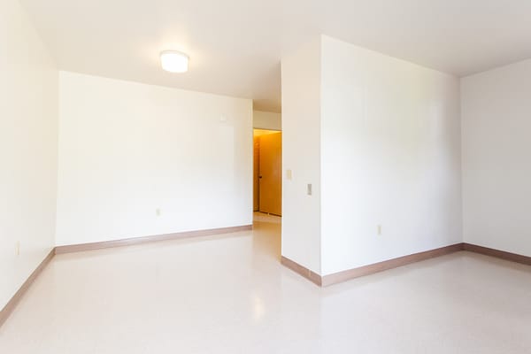 Empty interior room with minimal furnishings