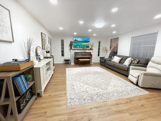 Bright interior lounge with piano and seating area