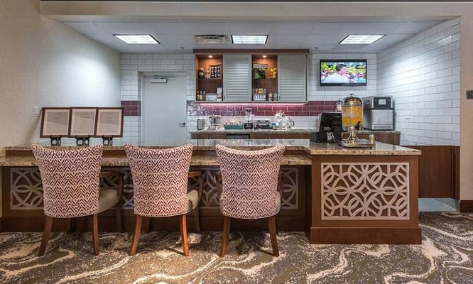 Interior view of a stylish common area with seating