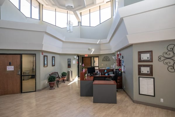 Bright interior of the facility's common area with reception