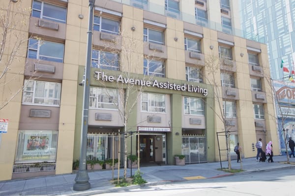 Exterior view of The Avenue Assisted Living building